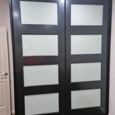 Painted metallic blue doors with inlaid opti glass 